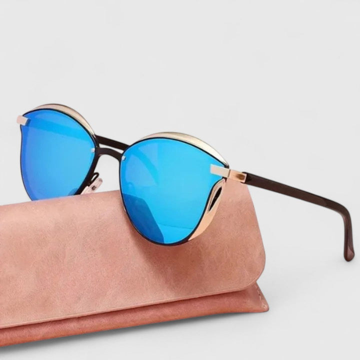 Emma & Rose Cape Town Preslee™ sophisticated blue sunglasses with stylish frame and tinted lenses, perfect for sunny days.