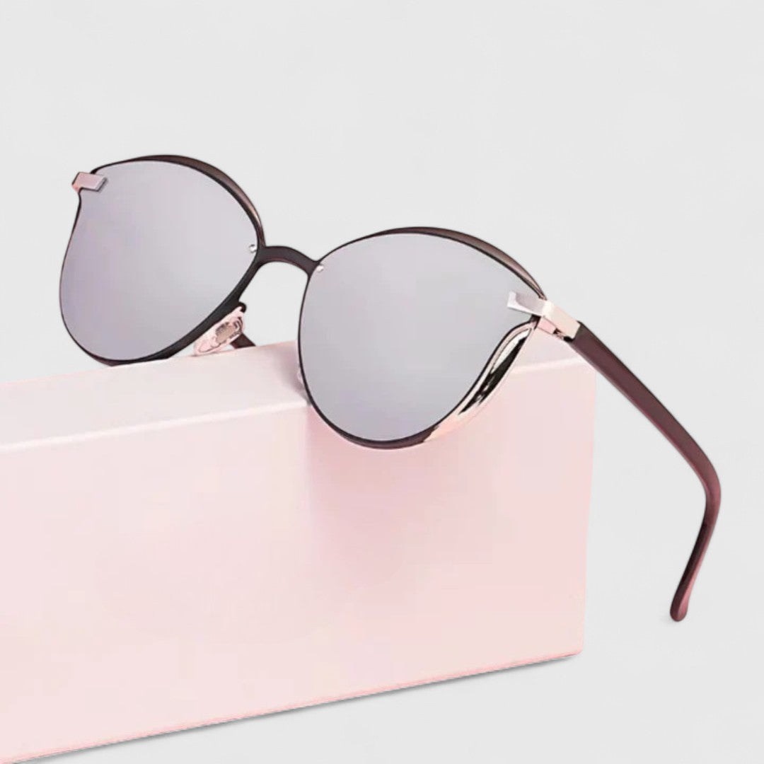 Emma & Rose Cape Town Preslee™ sophisticated blue sunglasses with sleek frame and stylish design.