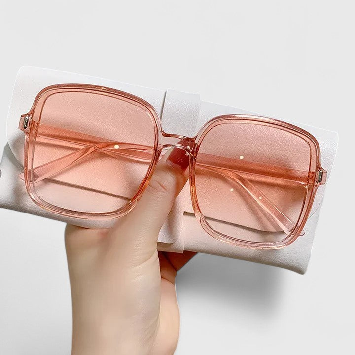 White Emalynn™ Elegant Sunglasses by Emma & Rose Cape Town with stylish frame and tinted lenses.