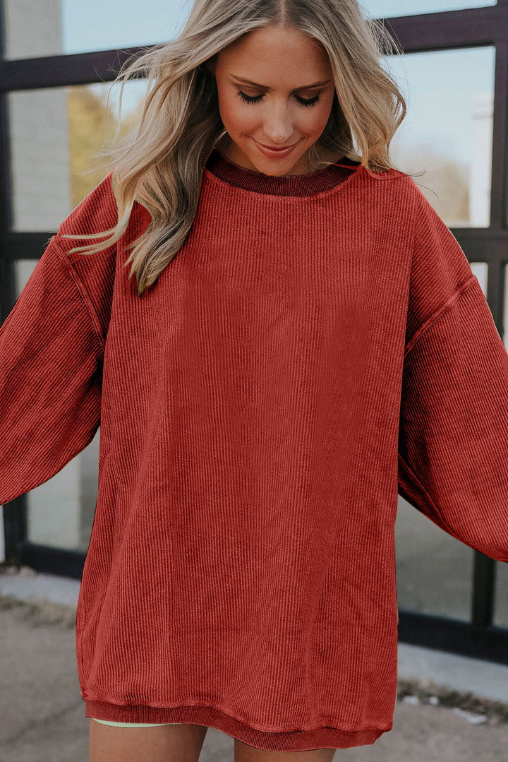 Apricot drop shoulder rib knit oversized sweatshirt from Emma & Rose Cape Town, cozy and stylish sweatshirt for casual wear.