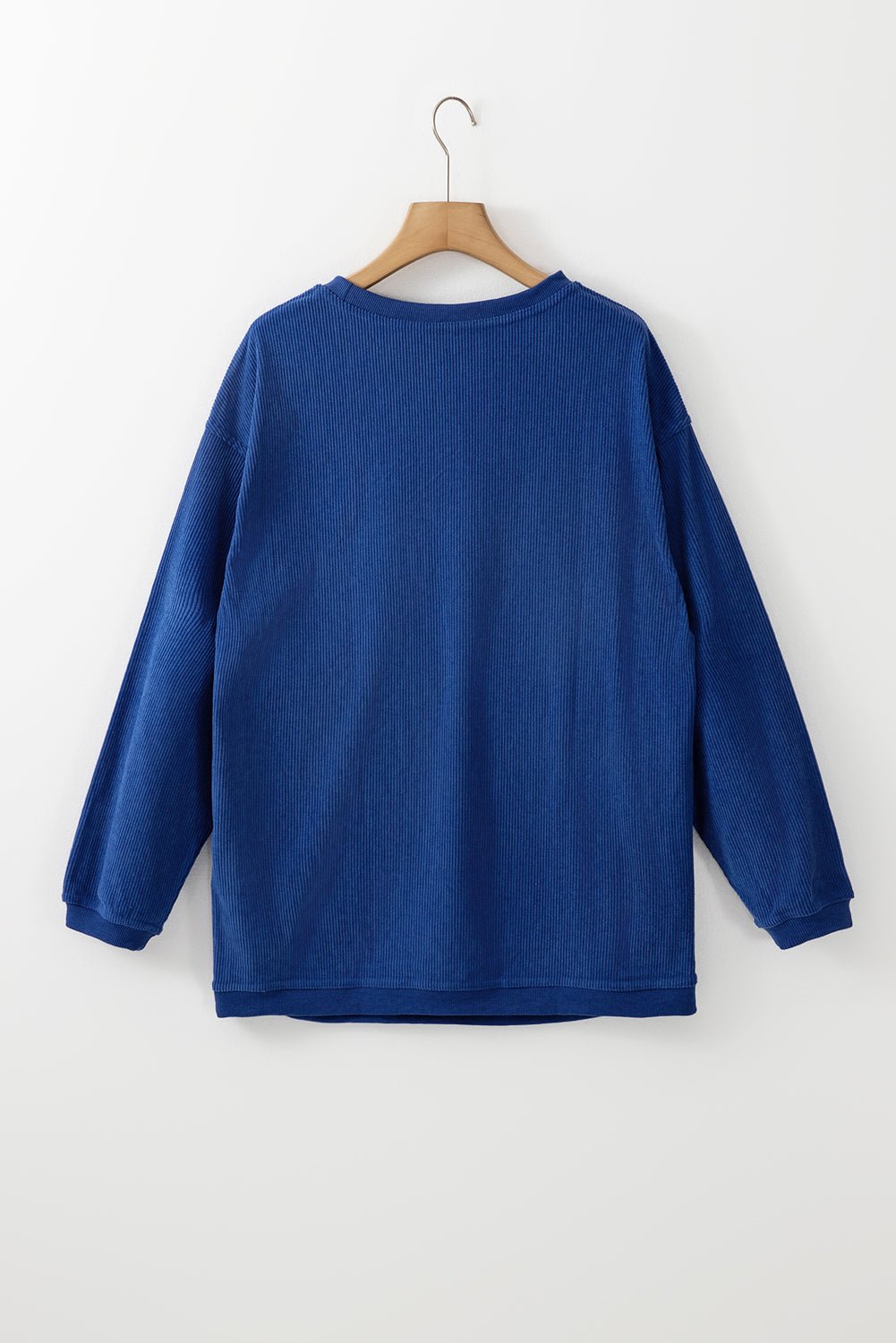 Apricot drop shoulder rib knit oversized sweatshirt by Emma & Rose Cape Town, featuring a relaxed fit and cozy fabric.