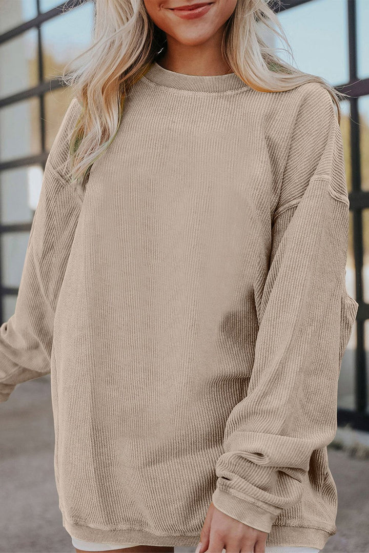 Apricot drop shoulder rib knit oversized sweatshirt by Emma & Rose Cape Town, featuring a relaxed fit and soft fabric.