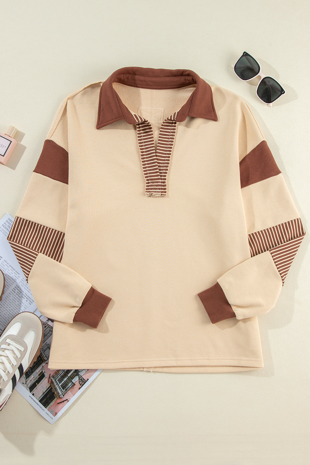 Dark blue striped patchwork collar sweatshirt by Emma & Rose Cape Town, featuring a cozy, stylish design with contrasting patchwork details.