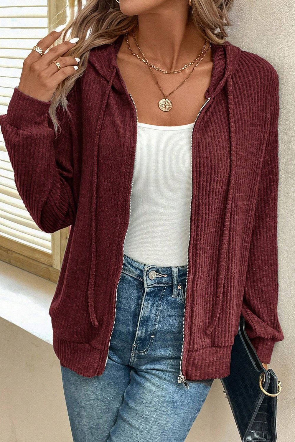 Red Dahlia Ribbed Zip Front Drawstring Hoodie from Emma & Rose Cape Town, featuring a cozy ribbed fabric and adjustable drawstring.
