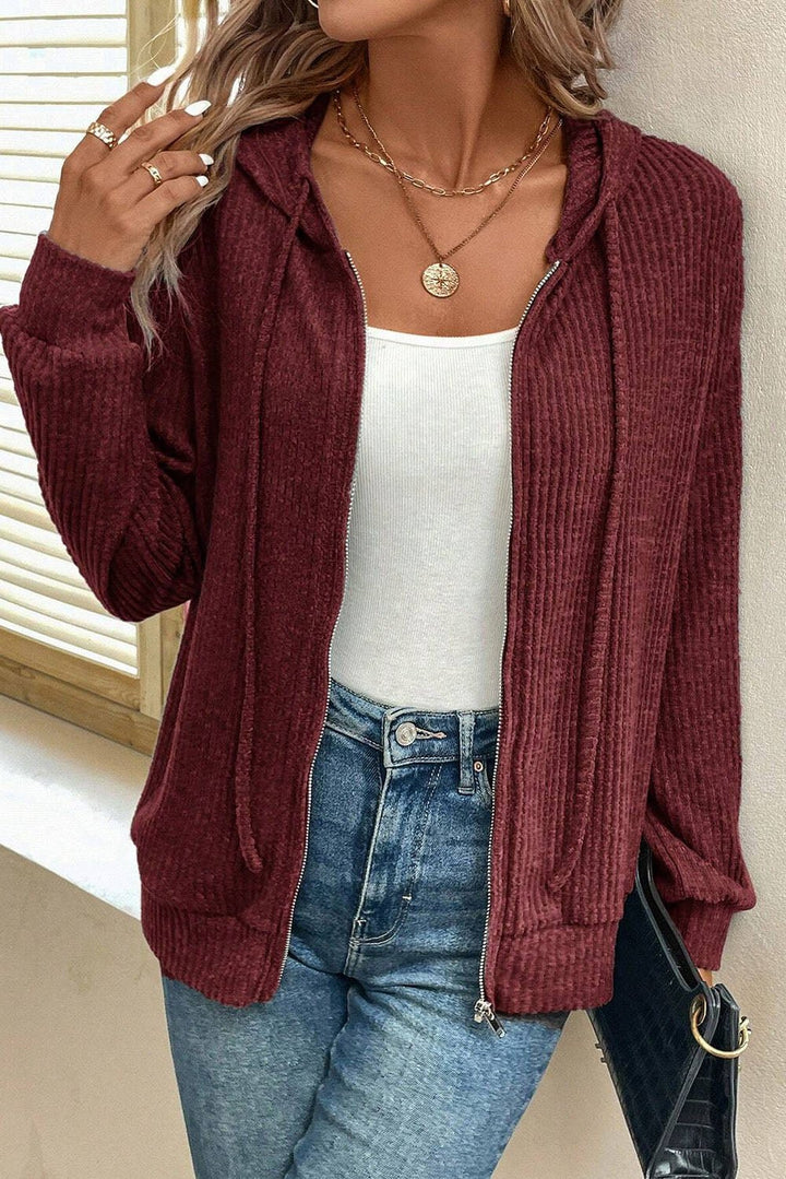 Red Dahlia Ribbed Zip Front Drawstring Hoodie from Emma & Rose Cape Town, featuring a cozy ribbed fabric and adjustable drawstring.