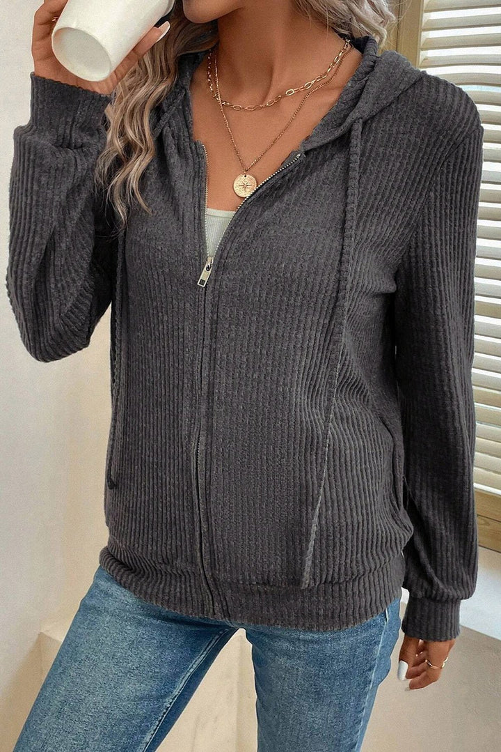 Red Dahlia ribbed zip-front drawstring hoodie by Emma & Rose Cape Town, featuring a cozy sweatshirt design with a front zipper.