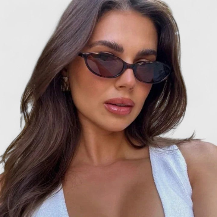 Emma & Rose Cape Town Grayslyn sophisticated sunglasses with dark tinted lenses and stylish black frames.
