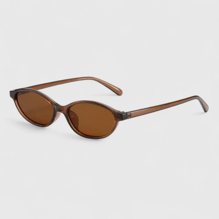 Emma & Rose Cape Town Grayslyn sophisticated sunglasses with stylish frame and tinted lenses, shown on a model.