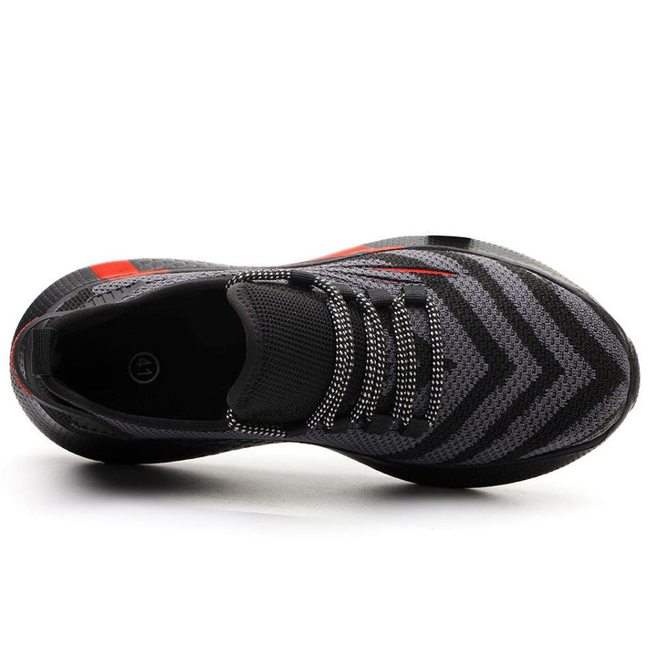 Orange Protective™ Indestructible Trainers for kids by Emma & Rose Cape Town, durable shoes with sturdy design and vibrant color.