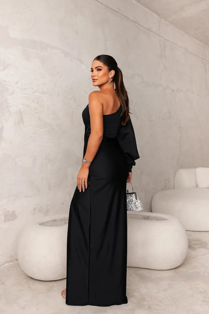 Turquoise Alionessah™ elegant maxi dress by Emma & Rose Cape Town, showcasing flowing fabric and sophisticated design.