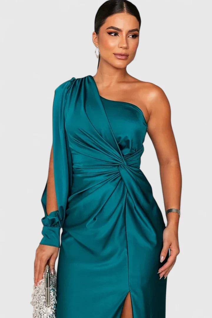 Turquoise Alionessah™ elegant maxi dress by Emma & Rose Cape Town, showcasing flowing fabric and stylish design.