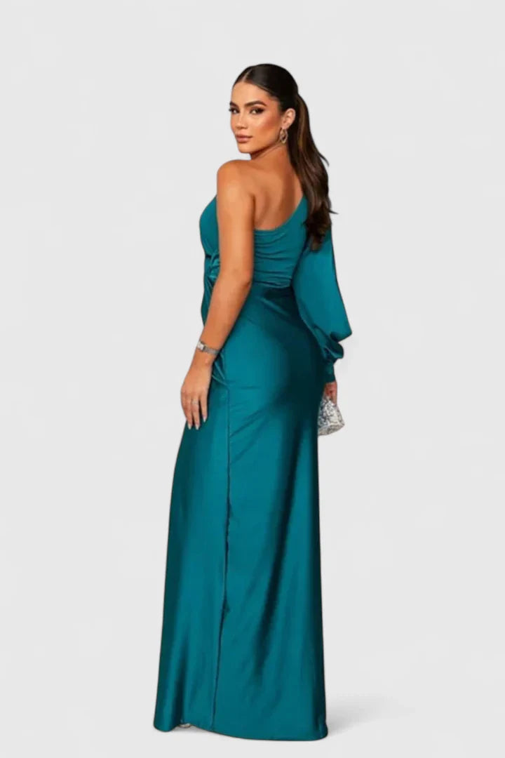 Turquoise Alionessah™ elegant maxi dress by Emma & Rose Cape Town, featuring flowing fabric and stylish design.