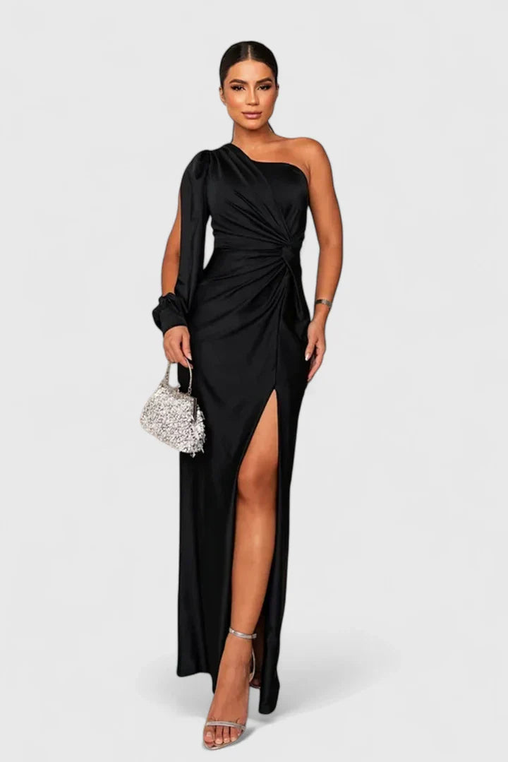 Turquoise Alionessah™ elegant maxi dress by Emma & Rose Cape Town, featuring flowing fabric and a stylish silhouette.