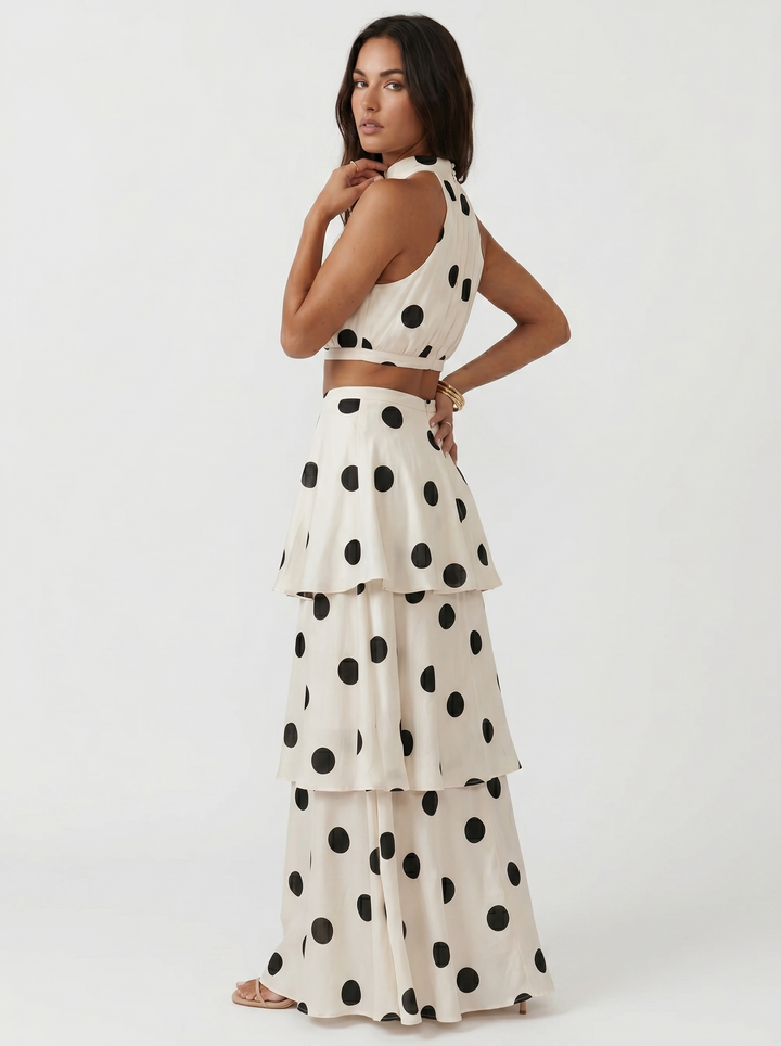 Emma & Rose Cape Town Lucía polka dot top and long skirt set, stylish dress with a fitted vest and flowing skirt.