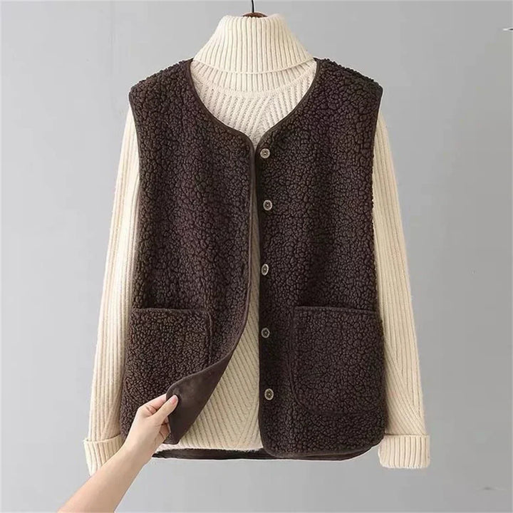 Beige Faye™ vest by Emma & Rose Cape Town featuring luxe soft, luxurious fabrics and a stylish sleeveless design.