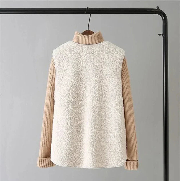 Beige Faye™ vest from Emma & Rose Cape Town made of soft luxurious fabrics, styled with a relaxed fit and elegant design.