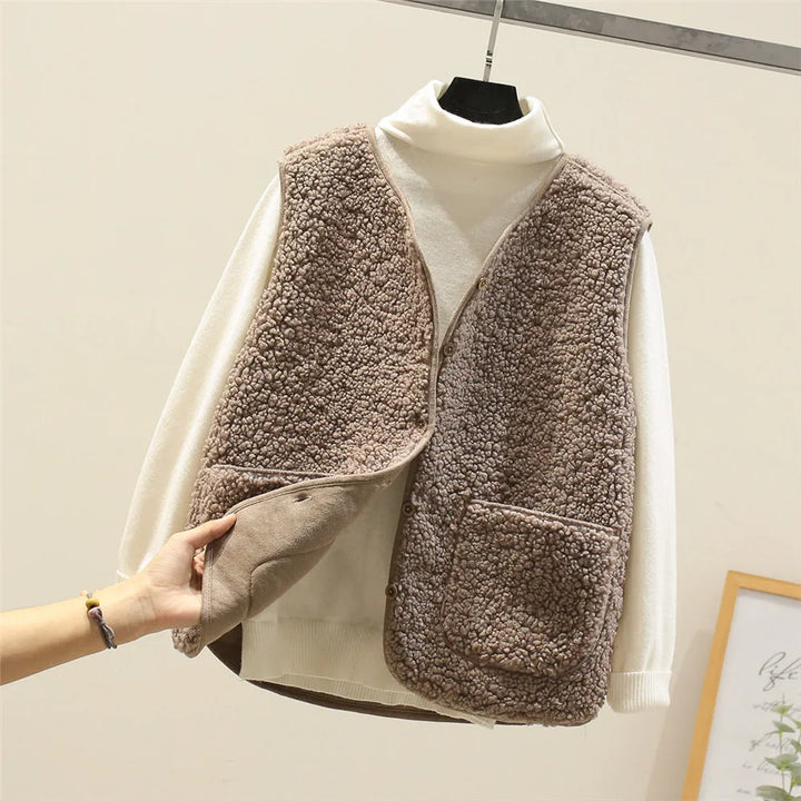 Beige Faye™ luxe soft fabric vest by Emma & Rose Cape Town, featuring a stylish, comfortable sleeveless design.