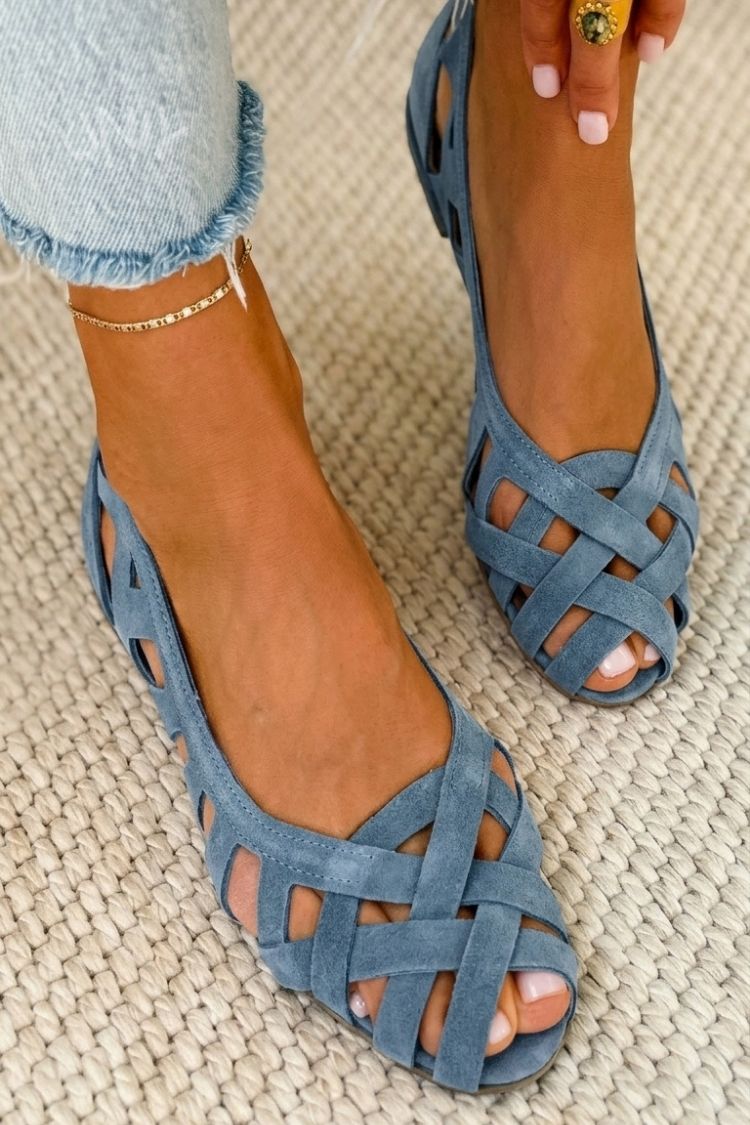 Flat open-toe sandals with woven fabric