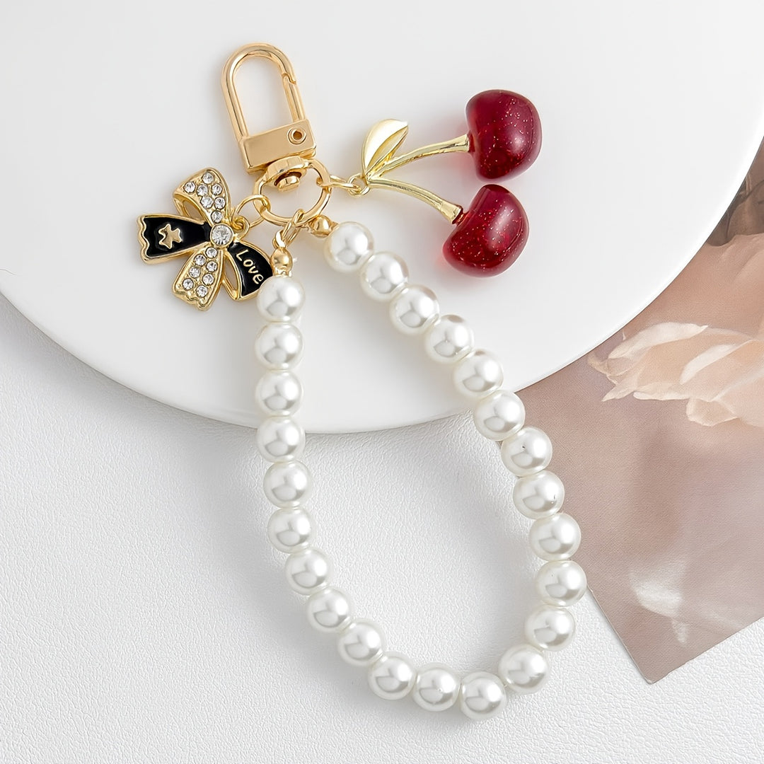 Emma & Rose Cape Town Cherrish Luxe Pearl Cherry accessory with white pearls and elegant design.