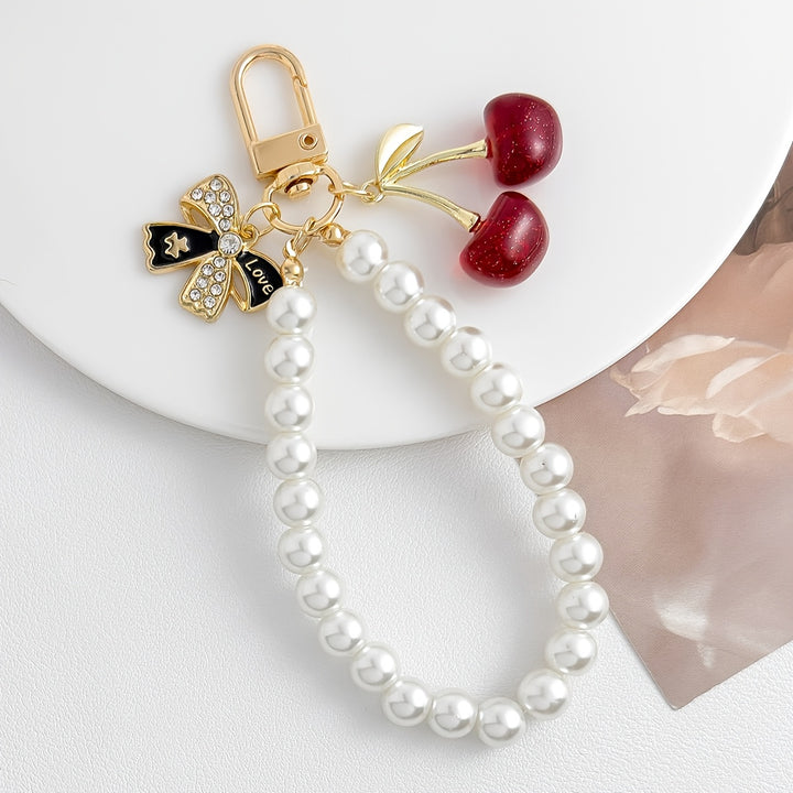 Emma & Rose Cape Town Cherrish Luxe Pearl Cherry accessory with white pearls and elegant design.