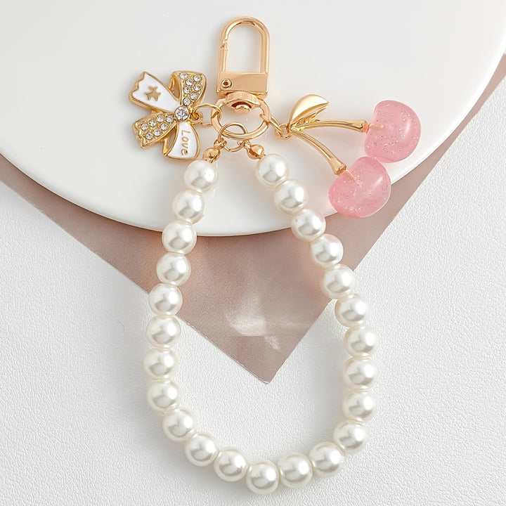 Emma & Rose Cape Town Cherrish Luxe Pearl Cherry accessory with white pearls and elegant design.