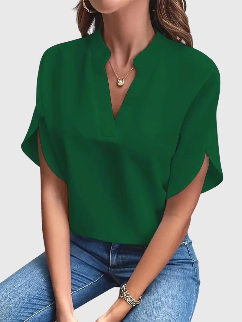 Emma & Rose Cape Town Beatrix soft elegant V-neck shirt in white, featuring a relaxed fit and smooth fabric for a stylish look.