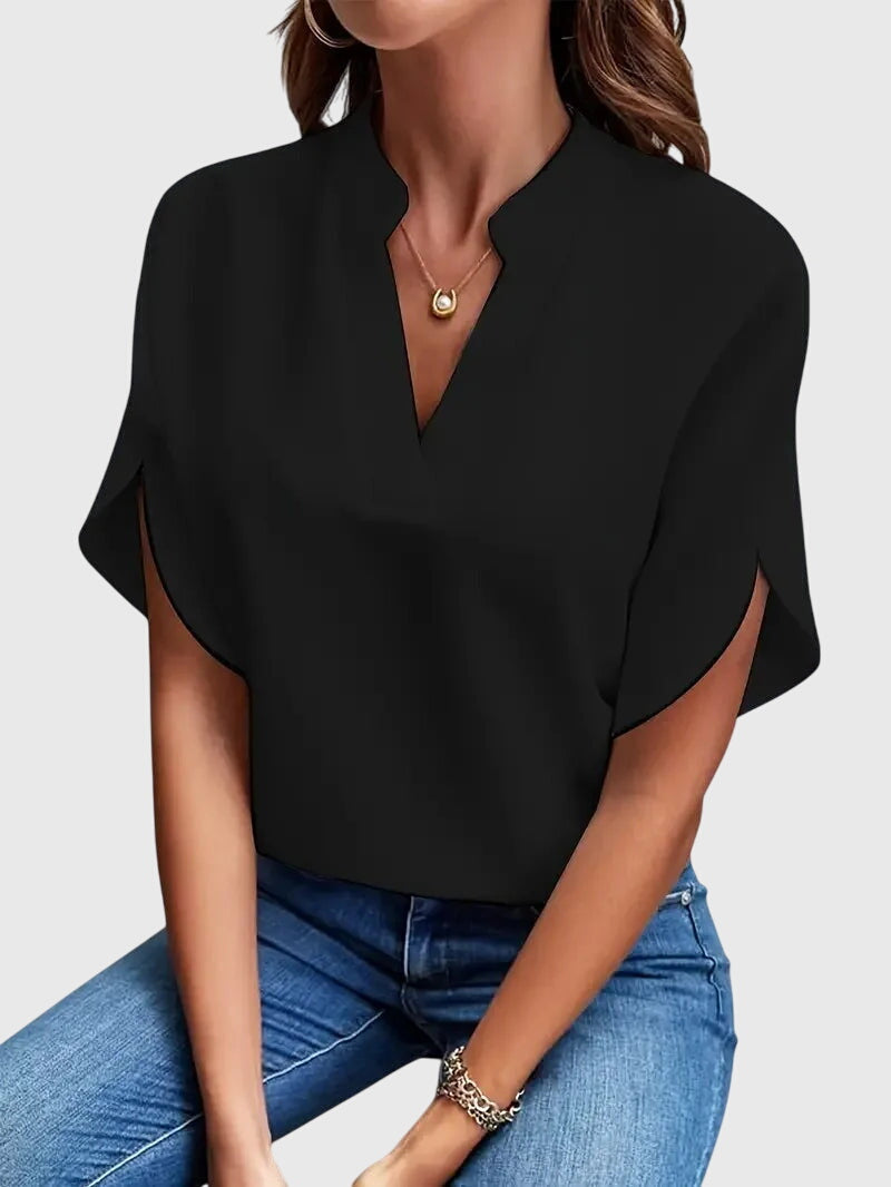 White Beatrix™ soft elegant V-neck shirt by Emma & Rose Cape Town, showing the relaxed fit and smooth fabric.