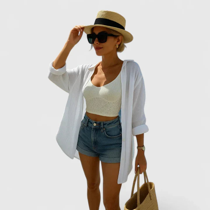 Lynsyann™ elegant white blouse by Emma & Rose Cape Town, featuring a stylish, lightweight design with a classic collar and button details.