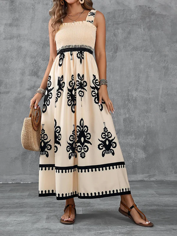 Emma & Rose Cape Town Martina maxi dress with artistic print, flowing white fabric and stylish design for elegant summer wear.