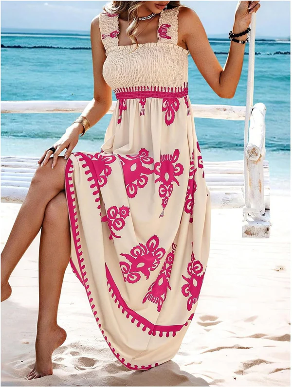 Emma & Rose Cape Town Martina maxi dress with artistic print, featuring a flowing silhouette and vibrant floral design.