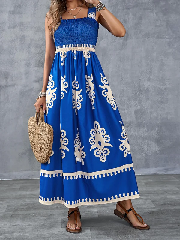 Emma & Rose Cape Town Martina maxi dress with artistic print, showcasing elegant design and vibrant pattern in soft fabric.