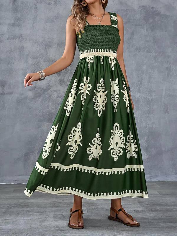Emma & Rose Cape Town Martina maxi dress with artistic print, flowing white fabric, and elegant design for summer wear