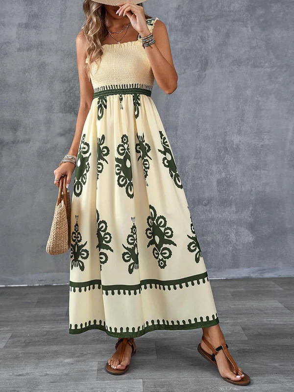 Emma & Rose Cape Town Martina maxi dress with artistic print, flowing white fabric, and elegant design for stylish summer wear.