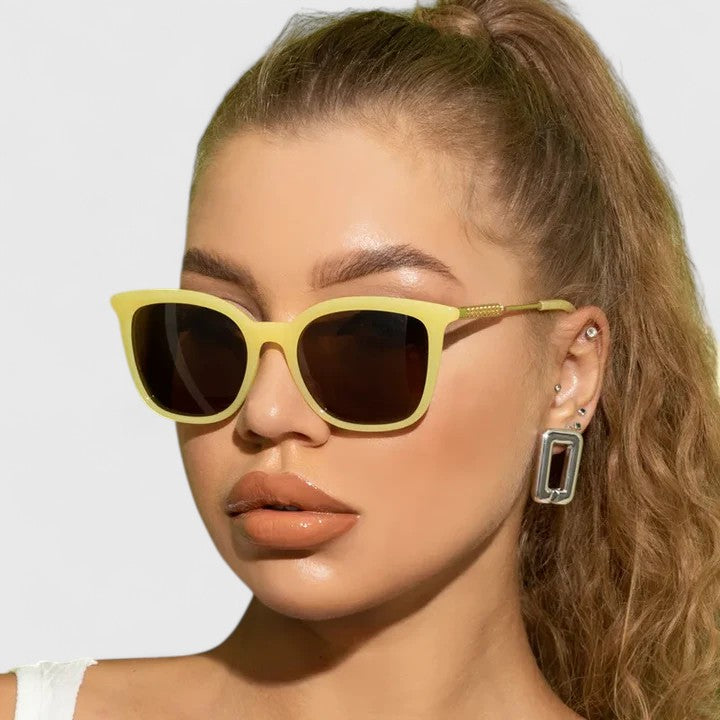 Emma & Rose Cape Town Savanuhh™ stylish white sunglasses with sleek frame and tinted lenses, perfect for fashionable sun protection.