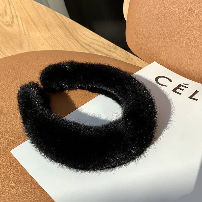 Black Monarque faux fur headband by Emma & Rose Cape Town, stylish women’s accessory with plush fur detail.