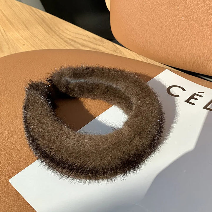 Black Monarque faux fur headband by Emma & Rose Cape Town, stylish women's accessory with plush fur for warmth and elegance.