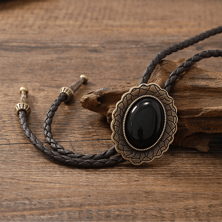 Emma & Rose Cape Town women's accessories featuring a Renegade Tribal Bolo Tie with intricate tribal design and metal tips.