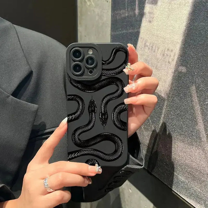 Gold serpent motif iPhone case for women by Emma & Rose Cape Town, featuring elegant snake design on a protective phone cover.