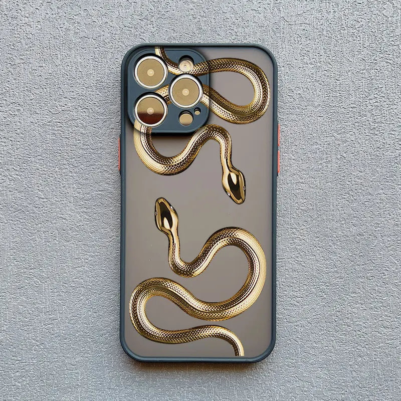 Gold iPhone X/Xs case with a serpent motif, designed by Emma & Rose Cape Town, featuring intricate detailing and elegant style.