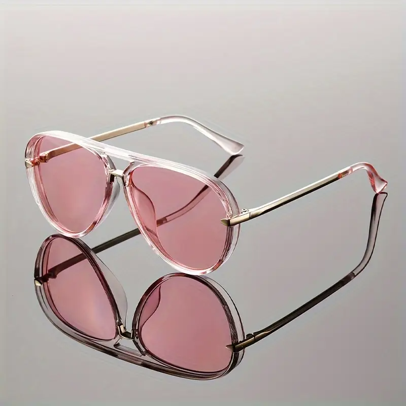 Women's Eros Aviator sunglasses by Emma & Rose Cape Town with black frames and tinted lenses, stylish accessory for women.