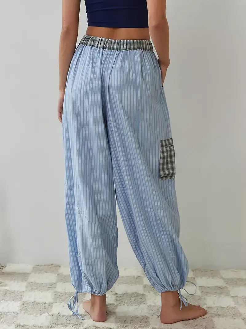 Pink women's lounge set by Emma & Rose Cape Town, featuring a comfortable top and matching pants for relaxed wear.