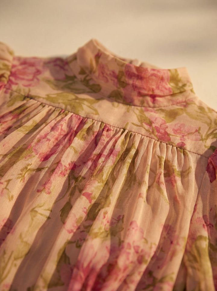 Emma & Rose Cape Town Rosario flowing floral dress in soft fabric, featuring a vibrant floral pattern and elegant silhouette.