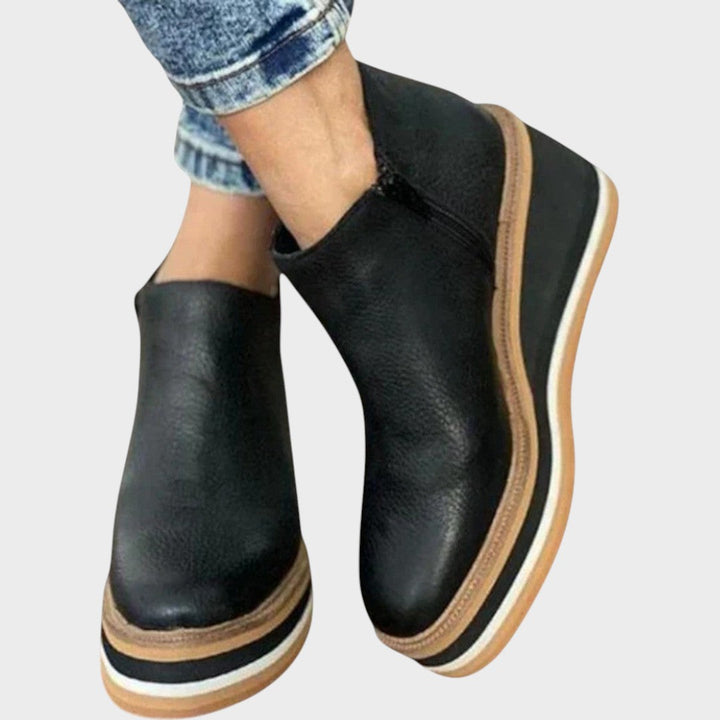 Emma & Rose Cape Town Vina™ Pu Leather Ankle Boots, stylish black zapato with sleek design and low heel.