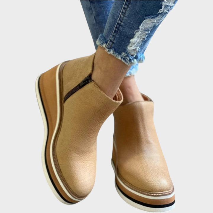 Emma & Rose Cape Town Vina™ Pu leather ankle boots with stylish design and low block heel, perfect for casual wear.