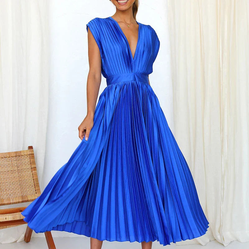 Fuchsia sleeveless women's dress by Emma & Rose Durban with elegant design, fitted bodice, and flowing skirt, perfect for formal occasions.