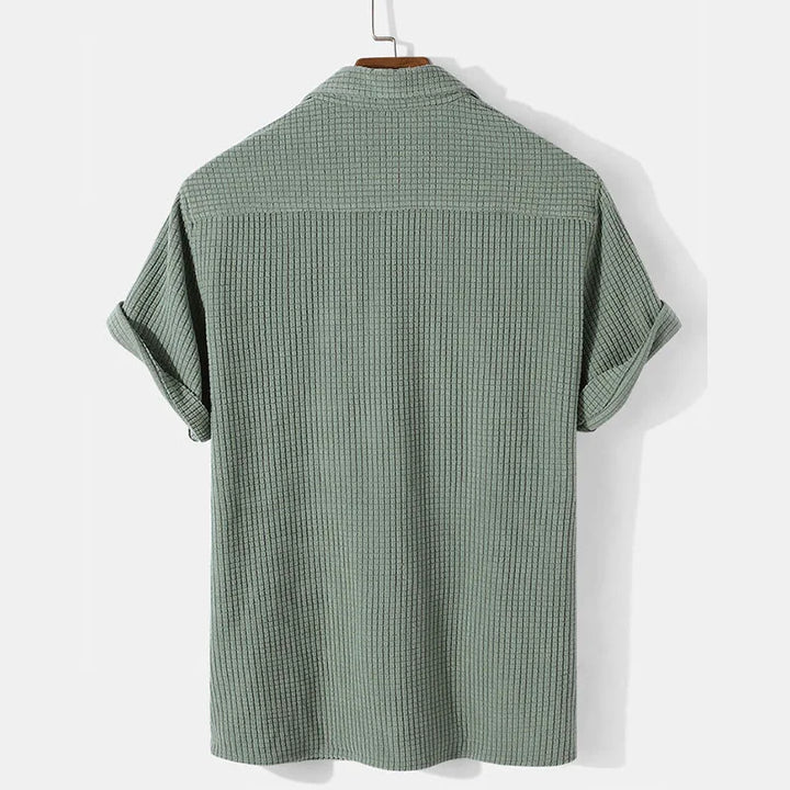 Khaki men's casual summer shirt from Emma & Rose Manhattan's Andries™ collection, featuring a relaxed fit and breathable fabric.