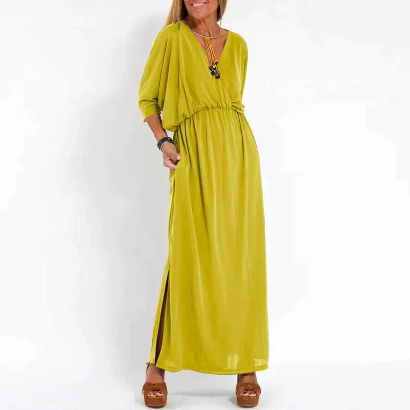 Light gray Emilia™ maxi dress for women by Emma & Rose Manhattan, flowing fabric and elegant design perfect for summer wear.