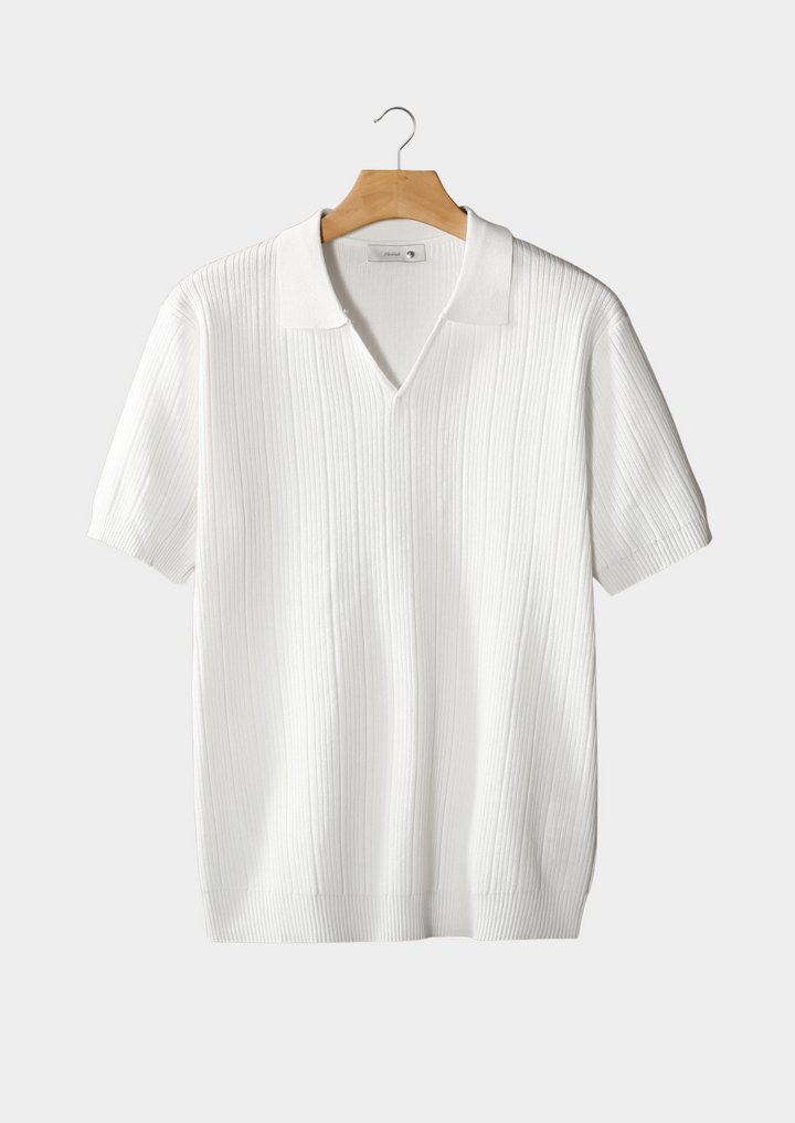 Navy Bram™ open collar ribbed polo shirt by Emma & Rose Manhattan, shown in size XS with a classic collar and textured fabric.