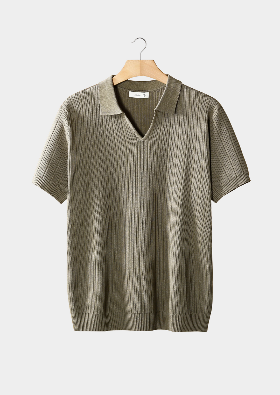 Navy Bram™ open collar ribbed polo shirt by Emma & Rose Manhattan, displayed on a model, showcasing the collar and textured fabric.