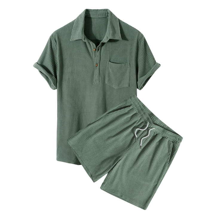 Emma & Rose Manhattan Tucker™ short-sleeved two-piece outfit in green, featuring a stylish top and matching shorts.